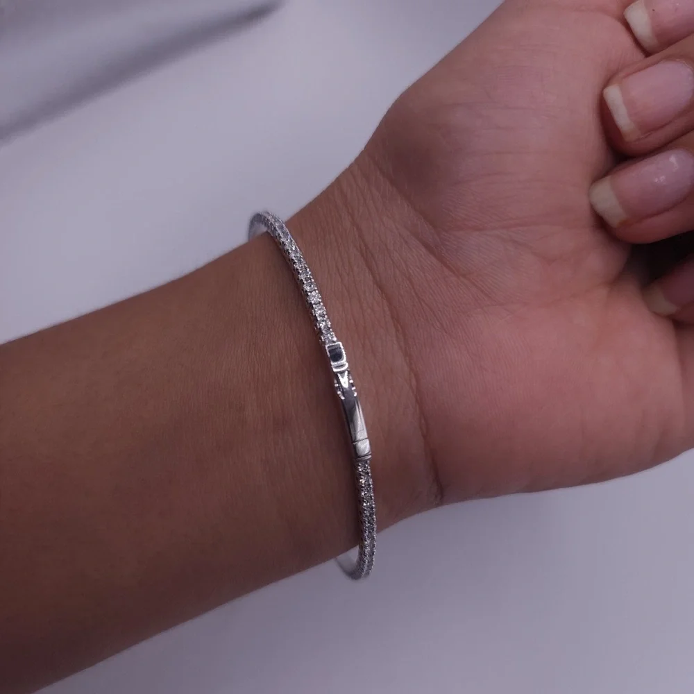 14 k w gold flexible bangle tennis bracelet w/over 3 carats of natural diamonds. - Picture 5 of 6
